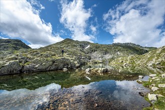 Hiker at a small lake