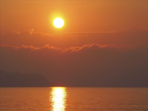 Sunrise over the sea in front of Ischia Ponte
