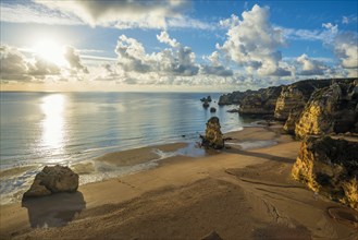 Coloured cliffs and sunrise at the beach