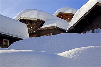 Chalets with deep snow in the village