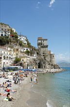 Holiday-makers on the beach