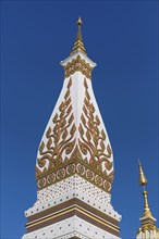 Lace of Chedi Wat Phra That Phanom decorated with golden ornaments