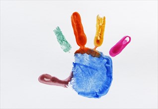 Colourful impression of a painted child's hand