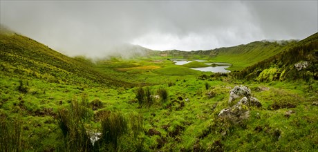 Crater of Caldeirao Volcano im mist