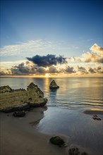 Coloured cliffs and sunrise at the beach