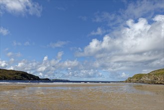Bay with sandy beach at low tide