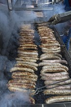Grilled sausages at an oven party