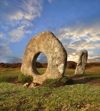 Men-an-Tol or Men an Toll known locally as the Crick Stone