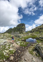 Hiker at a small lake