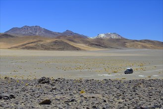 All-terrain vehicle on the lagoon route in the Andean highlands