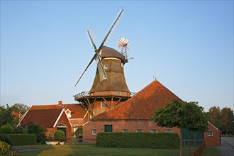 Pewsum mill museum with Pewsum windmill and Gulfhaus