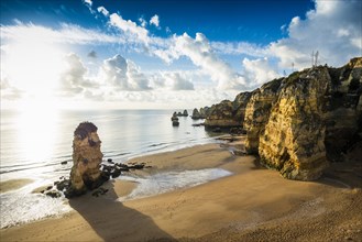 Coloured cliffs and sunrise at the beach