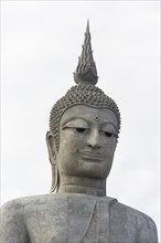Big Buddha statue at Wat Roi Phra Putthabat Phu Manorom