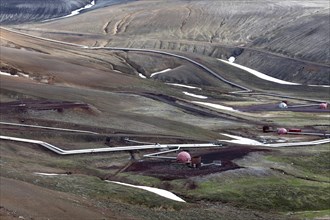 Pipelines of the geothermal power plant Krafla in volcanic landscape