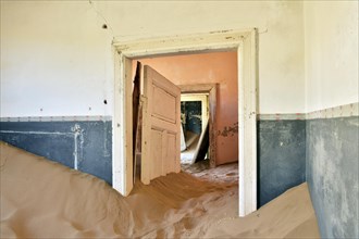 Desert sand in the ruined building of the former diamond city
