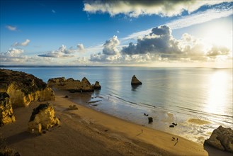 Coloured cliffs and sunrise at the beach