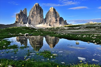 North walls of the Three Peaks of Lavaredo are reflected in the water