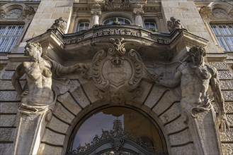 Two atlases at the entrance portal of the former building of the Bayerische Hypotheken- und Wechselbank