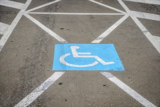 Sign for disabled parking on the ground
