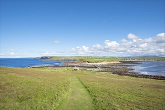 View from the tidal island Brough of Birsay to the island Orkney-Mainland