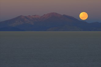 Full moon setting at dawn