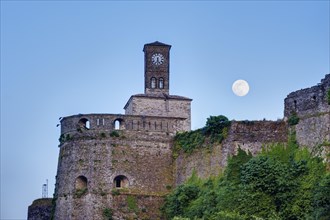 Clock tower on the castle at full moon