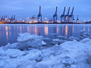 Ice chunks on the Elbe in the Port of Hamburg