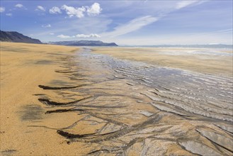 Sand structure with ripple at low tide