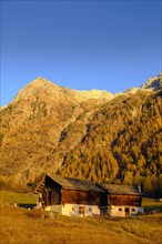 Mountain landscape with hut in autumn