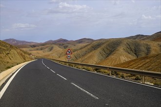Curvy road FV-605 in a barren mountain landscape