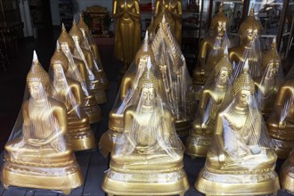 Buddha statues in foil