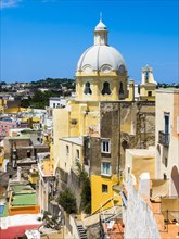 View of the island of Procida with its colourful houses and the church of Santuario S. Maria delle Grazie Incoronata