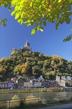 View over the Moselle to Cochem Castle in autumn