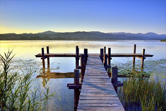 Wooden pier in the morning light at Pfaffikersee