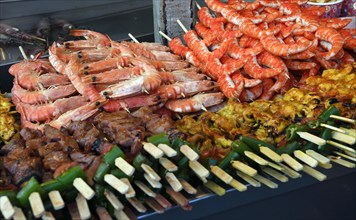 Various meat and seafood skewers