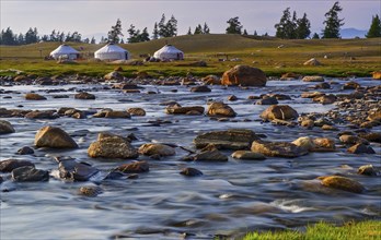 Nomads camp with yurts on the shore of Tuul river