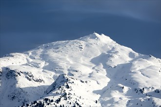 Snow-capped peak of the Gilfert in winter