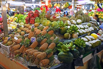 Typical stalls with a huge selection of fresh fruit and vegetables at Banzaan Fresh Market