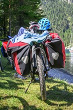 Packed mountain bike with panniers