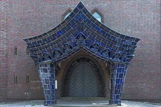 Expressionist entrance portal of the Protestant Church of the Holy Cross