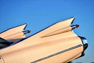 Cadillac shark fins in blue sky