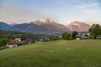 Watzmann massif and Hochkalter in the morning light in front of alpine meadows