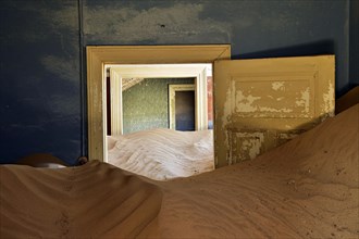 Desert sand in the ruined building of the former diamond city
