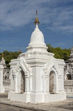 White kyauk gu cave stupa at Kuthodaw Pagoda