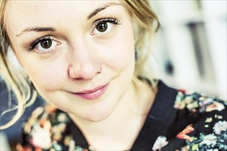 Young woman with nose piercing