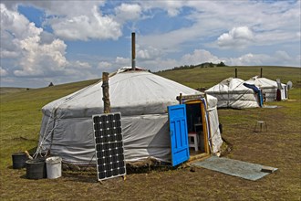 Yurts with solar cell and satellite dish in the steppe