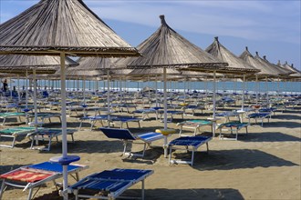 Parasols and sun loungers on the beach in Fushe-Drac near Durres