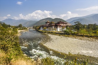 Buddhist monastery fortress Punakha Dzong at the river Mo Chhu