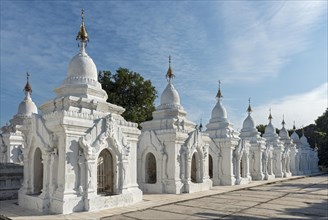 White kyauk gu cave stupas at Kuthodaw Pagoda