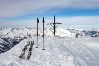 Peak cross of the Kogelsee peak with touring ski with Lechtaler Alps in winter